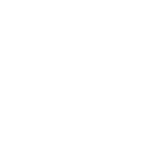 White light bulb icon with small lines around it representing light rays on black background.