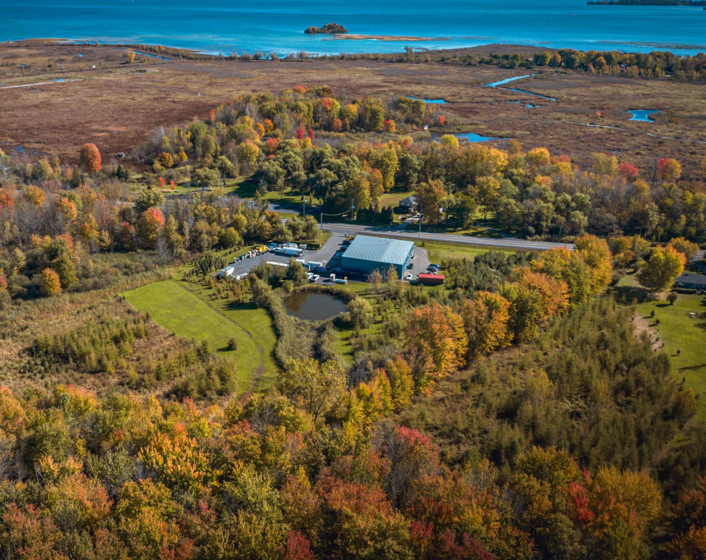 Aerial view of natural landscape and waterways surrounding an MRR facility site
