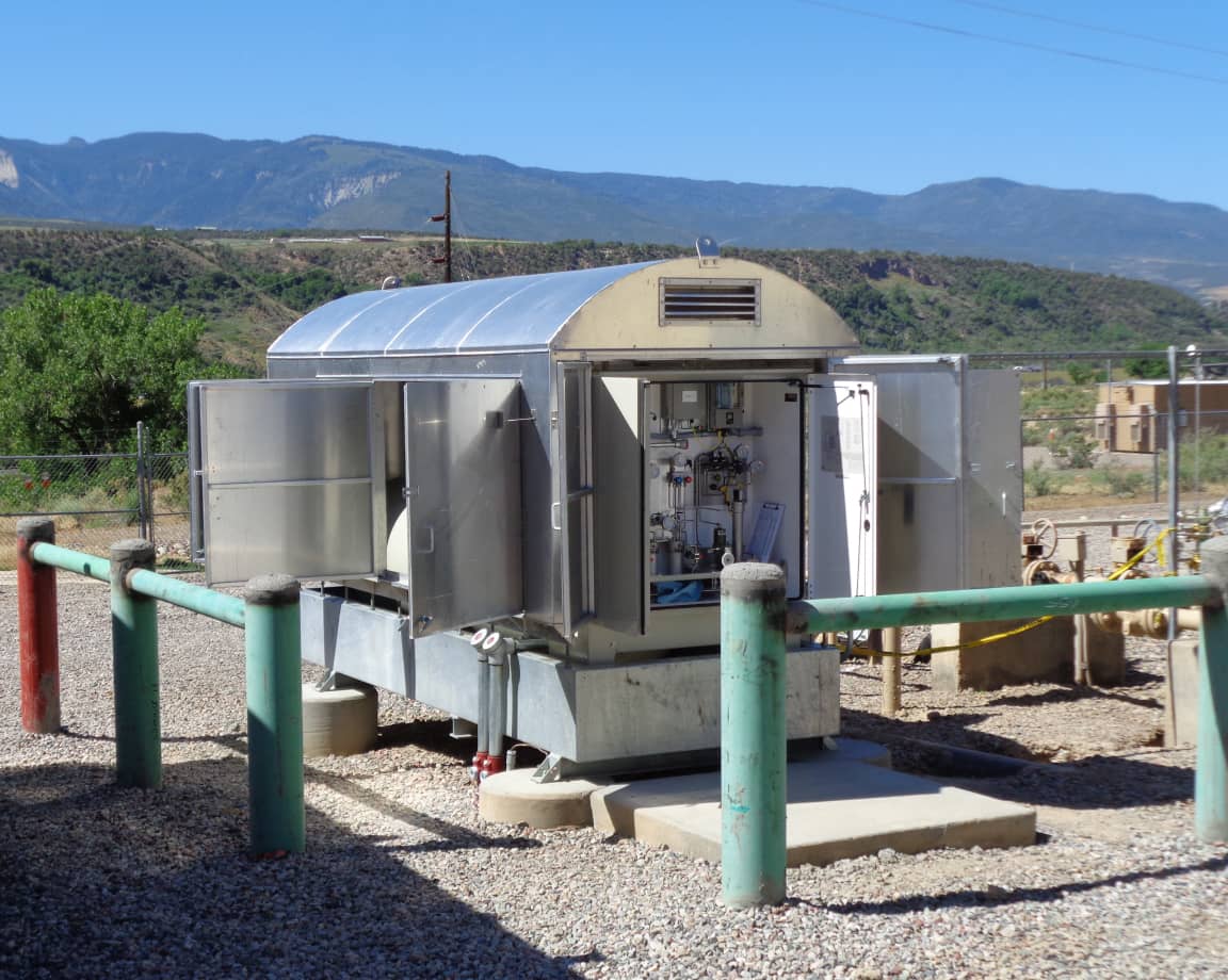 Outdoor odorization equipment enclosure with metering and control components