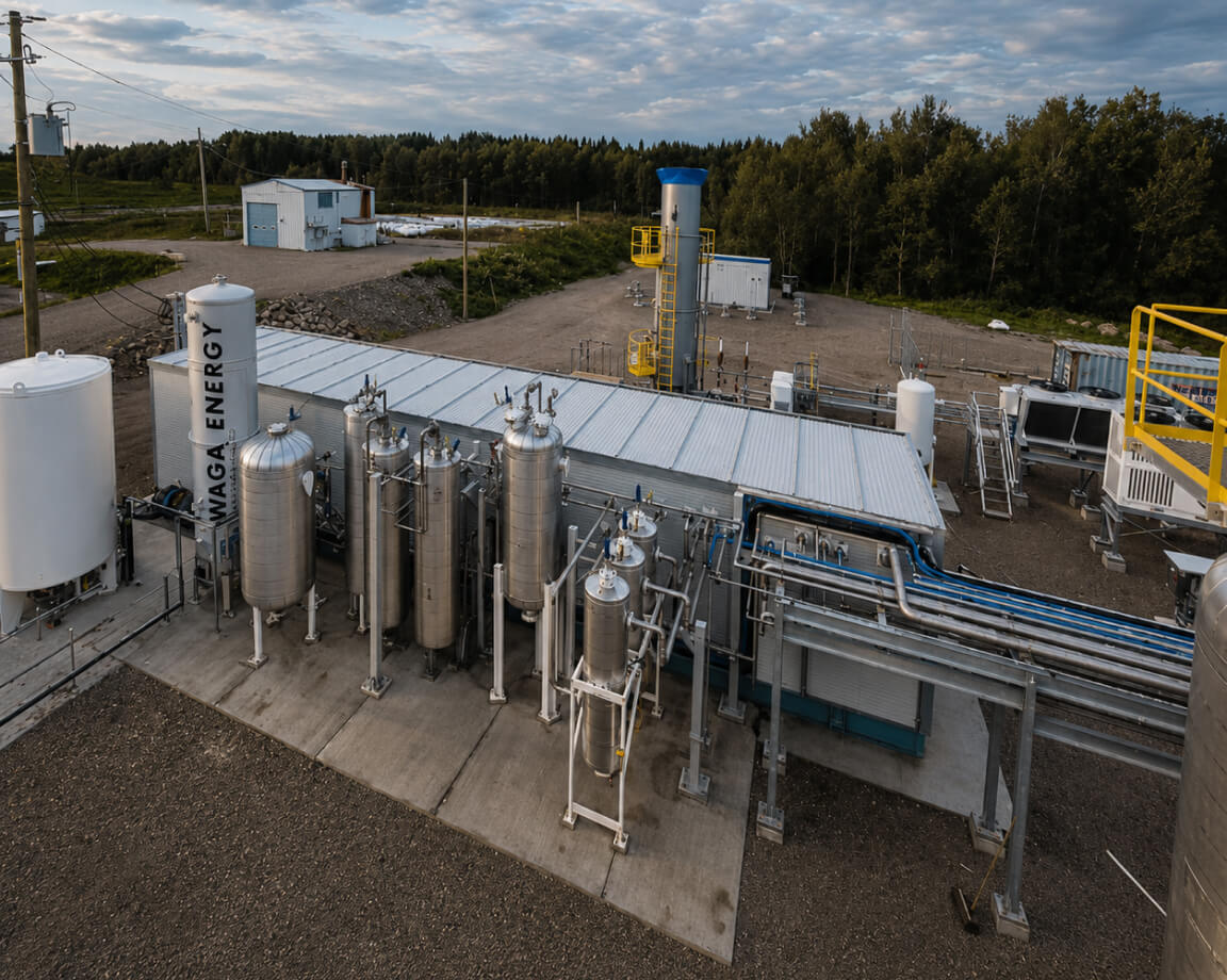 Aerial view of an RNG biogas upgrading facility with storage tanks