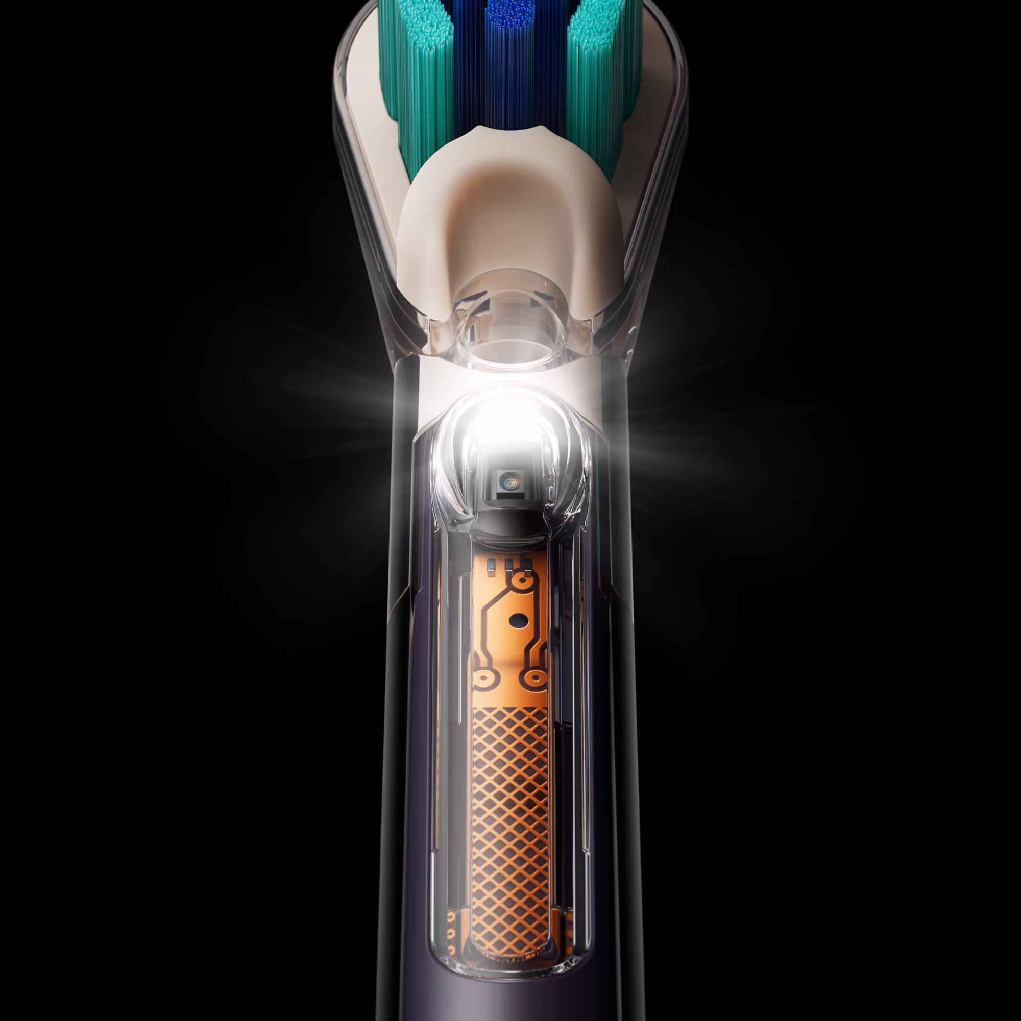Close-up of the Dyson CameraJet brush head with the built-in camera light illuminated.