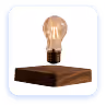 A glowing incandescent light bulb floating above a wooden block on a white background with a blue rounded square border.