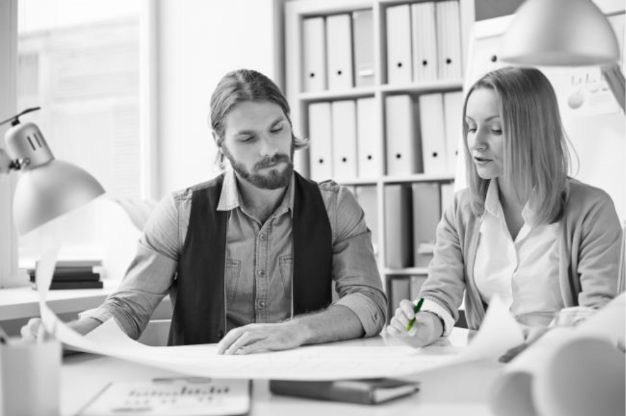 two colleagues busy planning