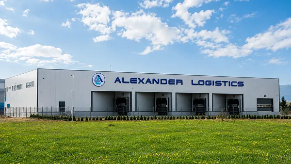 Alexander Logistics warehouse building with multiple loading dock doors.