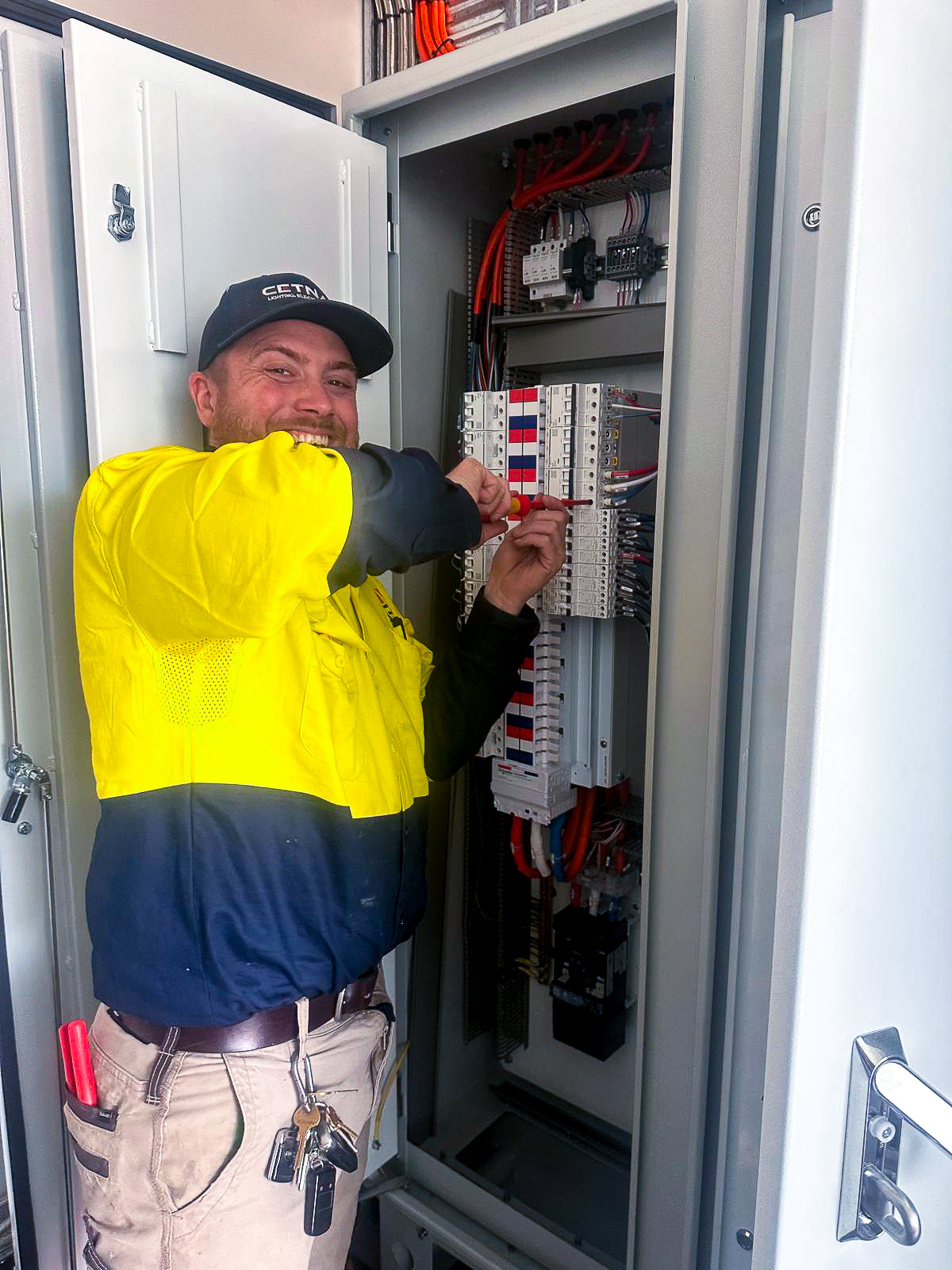 image of a technician installing solar panels