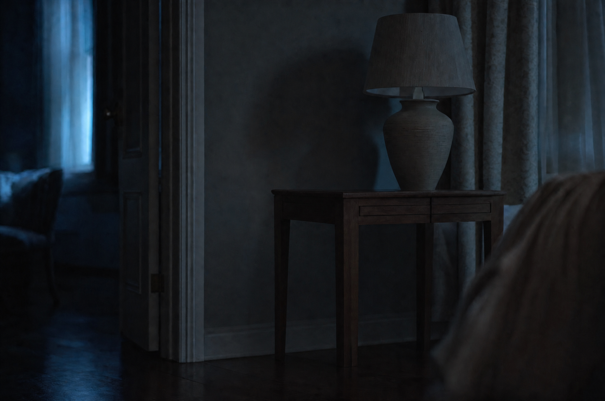 A dimly lit room at night, the setting for a technical surveillance sweep