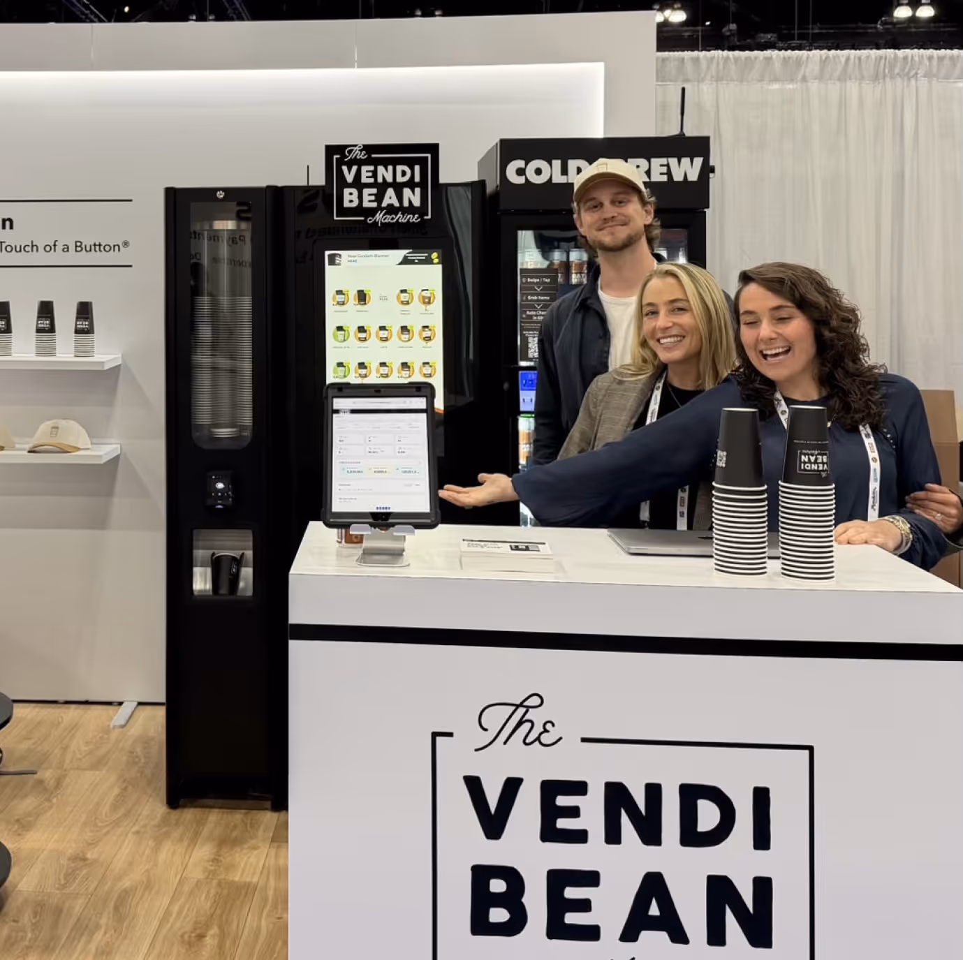 a group of people standing behind a counter