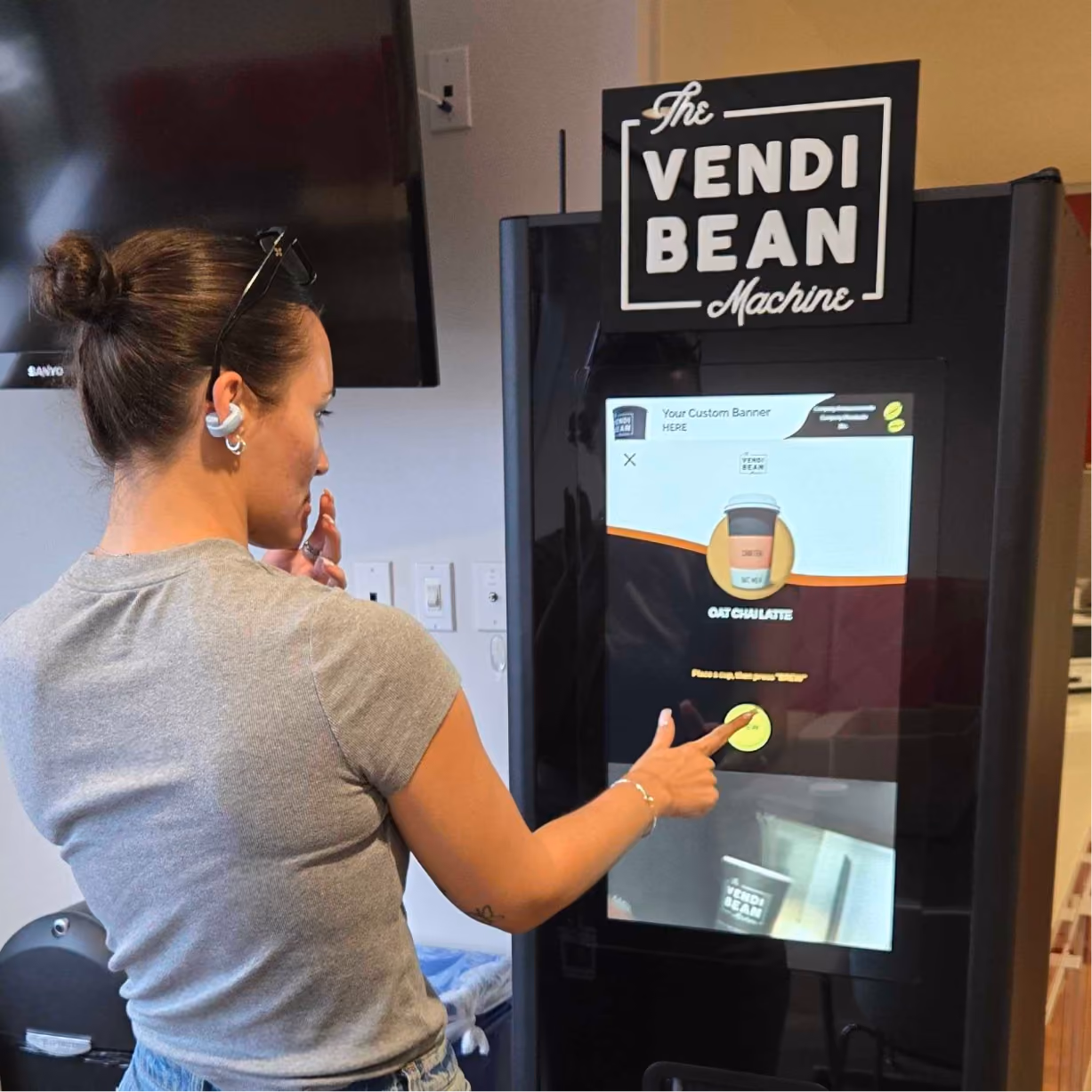 a woman using a touch screen device