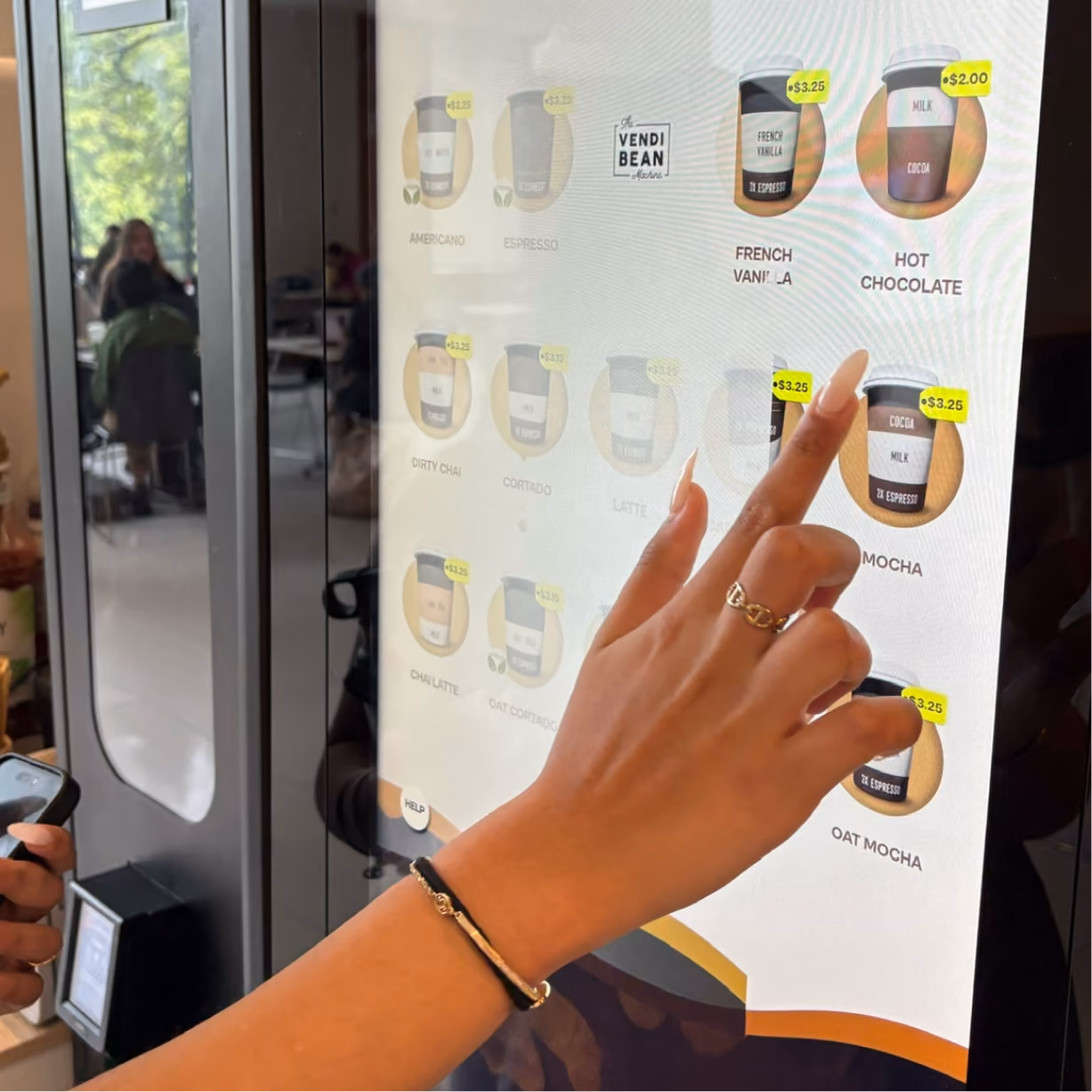 a hand touching a screen