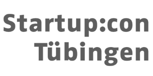 Textlogo Startup:con Tübingen in grauer Schrift auf weißem Hintergrund.
