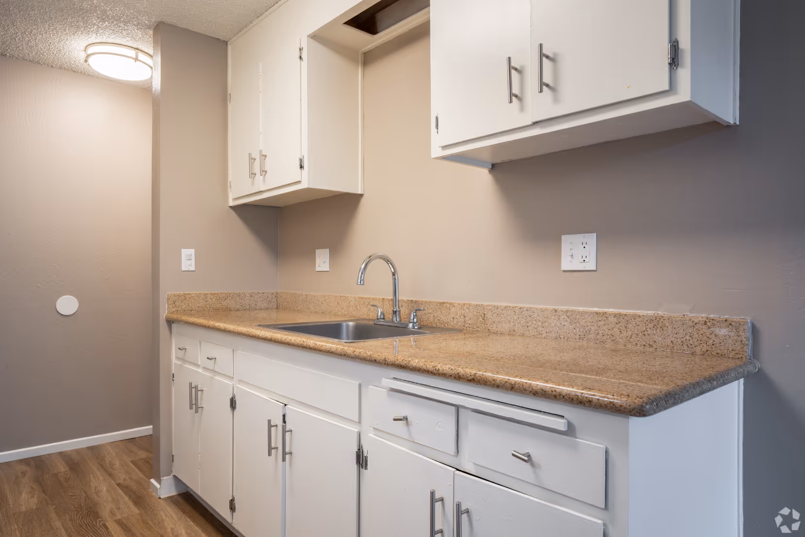 Kitchen with white cabinets