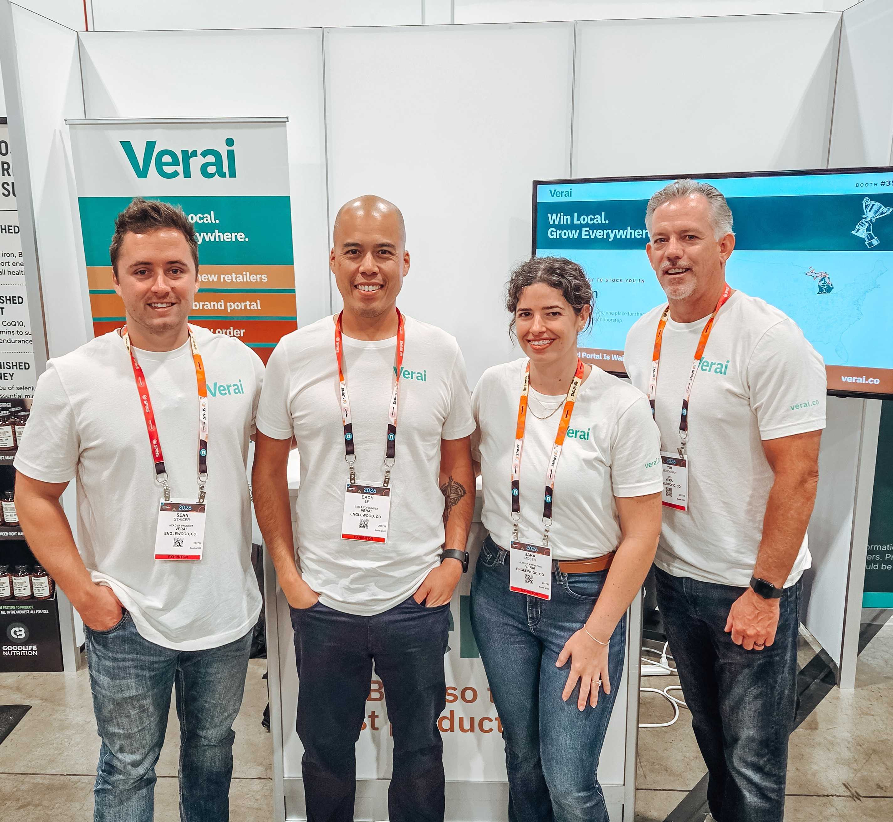Four members of the Verai team at Booth 352 during Newtopia Now in Denver