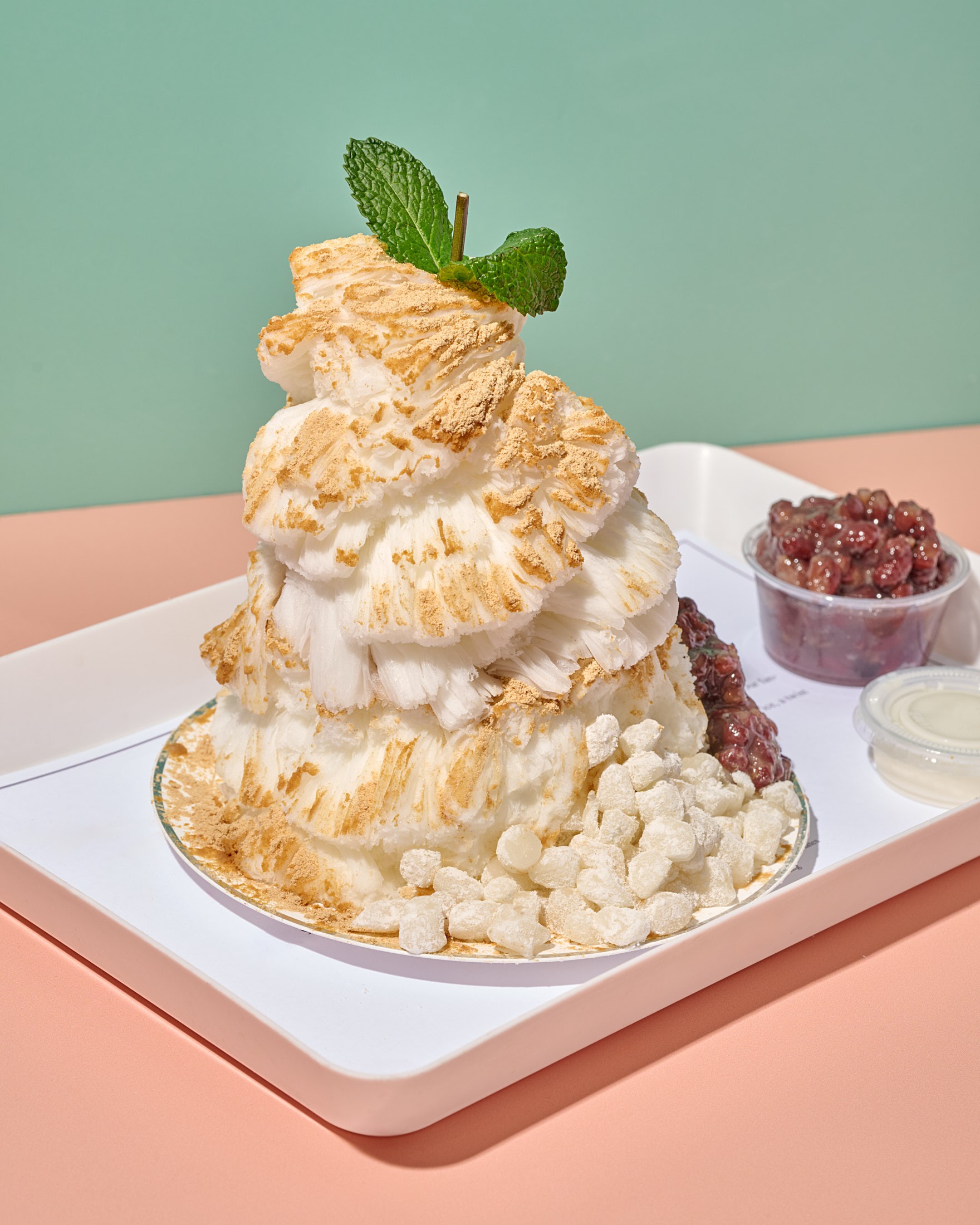 Injeolmi bingsu at Oakobing Koreatown with red bean and rice cake served on the side
