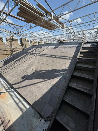 image of roof being repaired