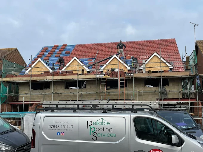 image of roofing contractor at work