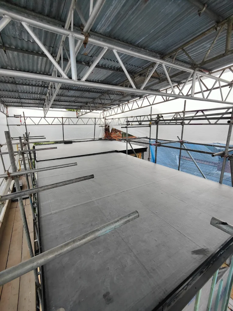 image of roofing contractor at work