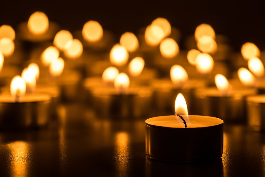 bigstock-Christmas-candles-burning-at-n-108500090