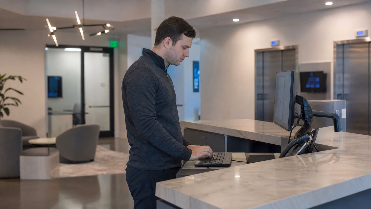 RECEPTION AREA An IT professional one person standing at a front reception d