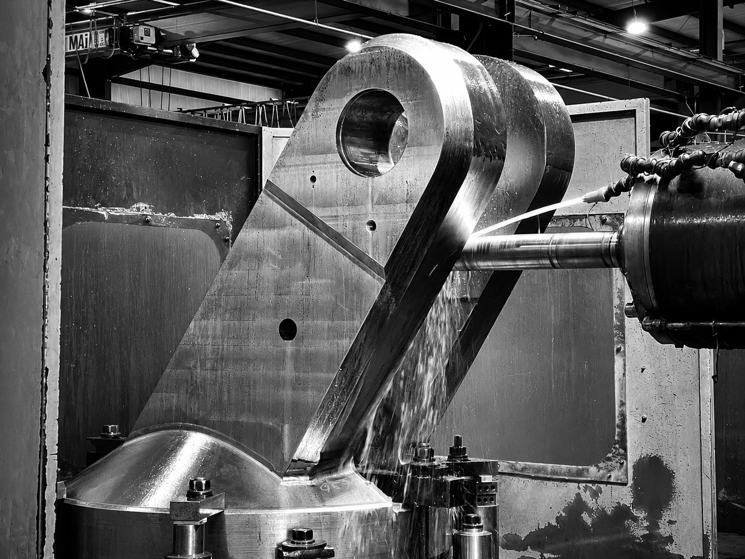 Large machined industrial component in CNC machining setup