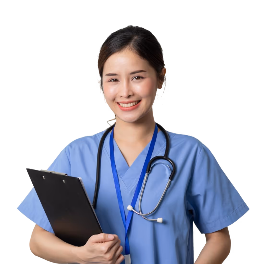 Smiling female healthcare worker in blue scrubs with stethoscope holding a clipboard.