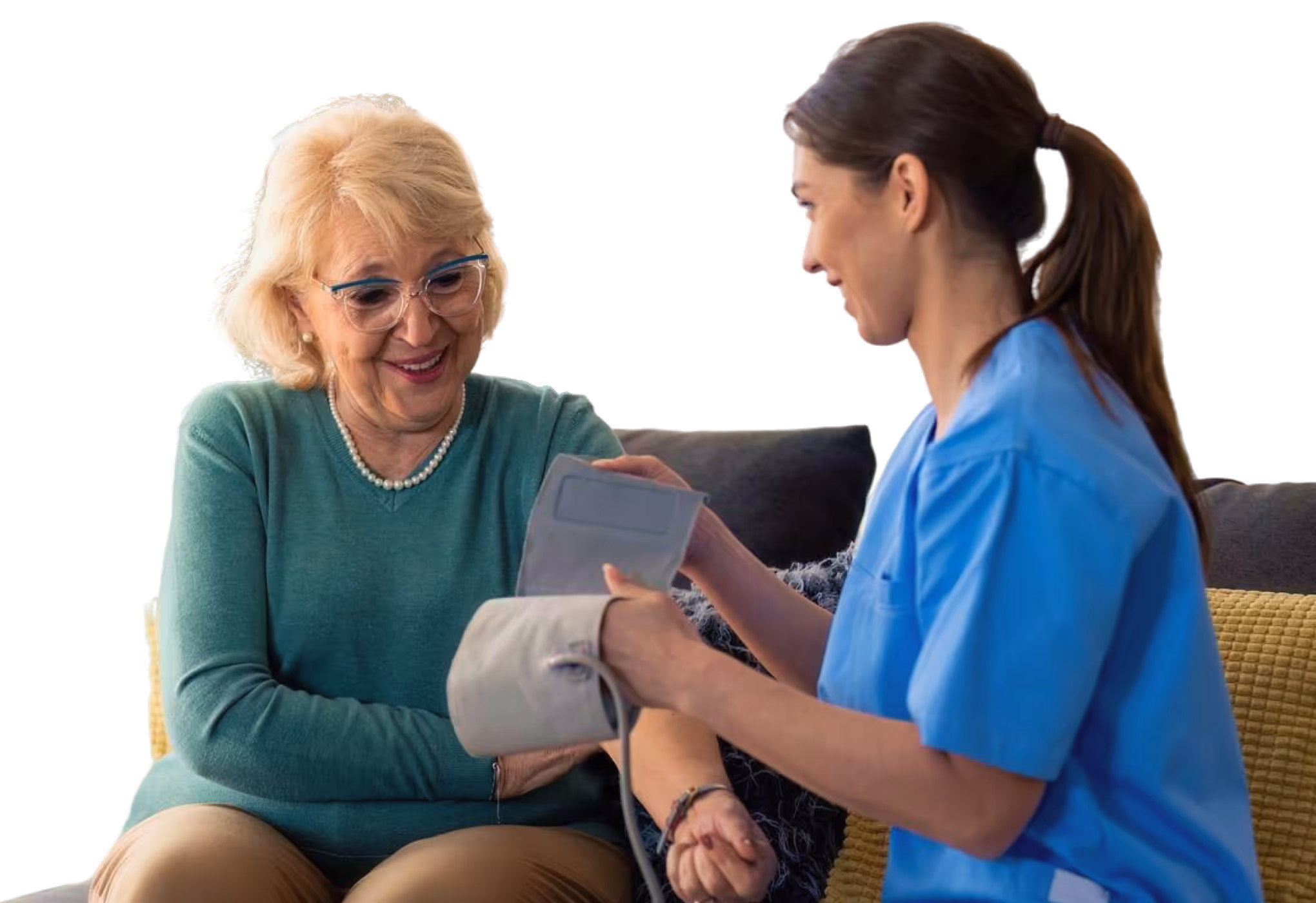 Nurse in blue scrubs measuring elderly woman's blood pressure with a cuff on her arm.