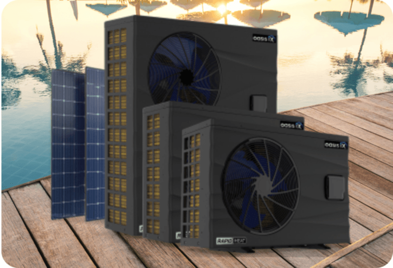 Two black Oasis heat pump units with solar panels on wooden dock by water reflecting trees.