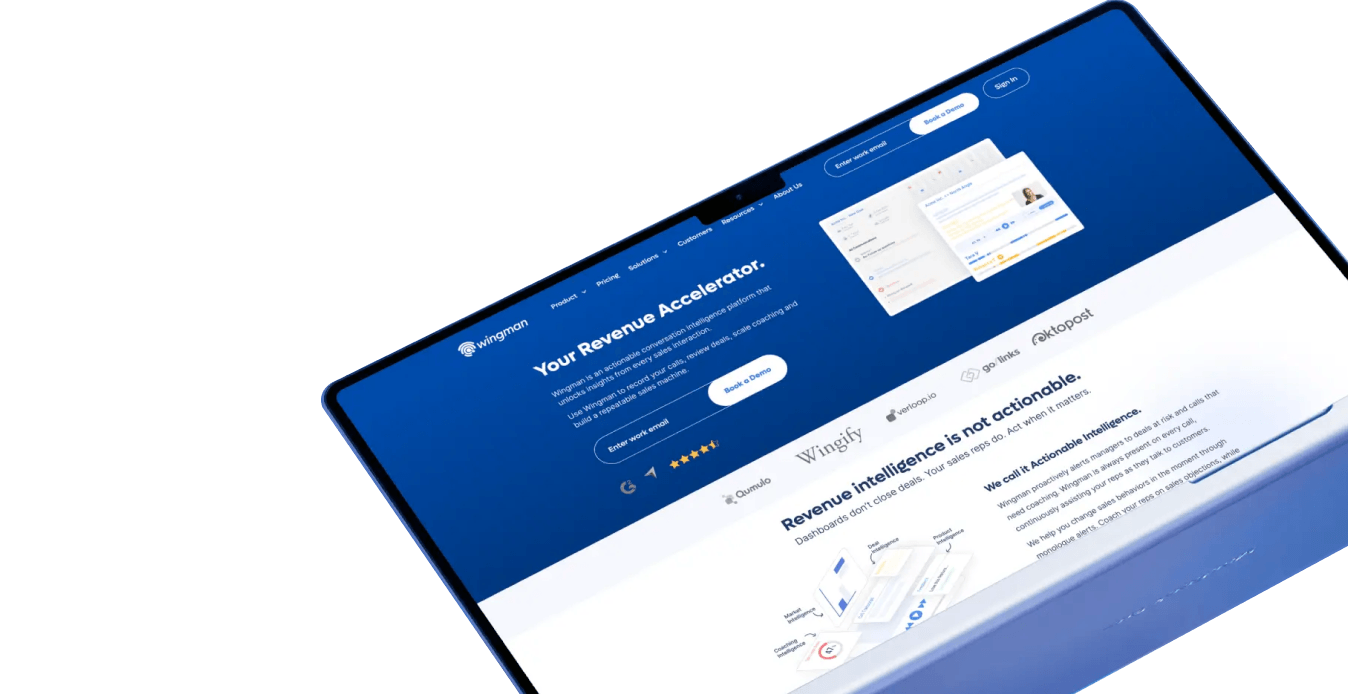 Tablet showing Wingman website homepage with revenue accelerator platform and demo booking option.