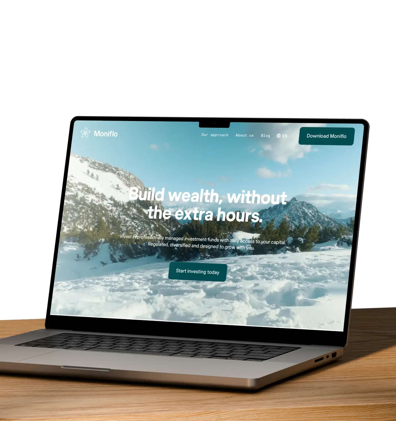Laptop on wooden table displaying Moniflo website with snowy mountain background and investment call to action.