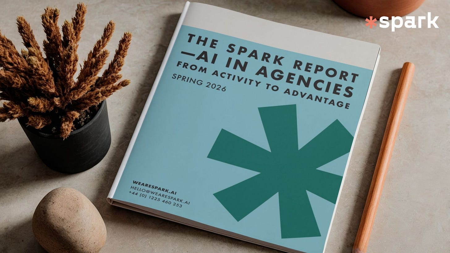 Spark AI report on AI adoption in agencies, showing a branded report cover on a desk.
