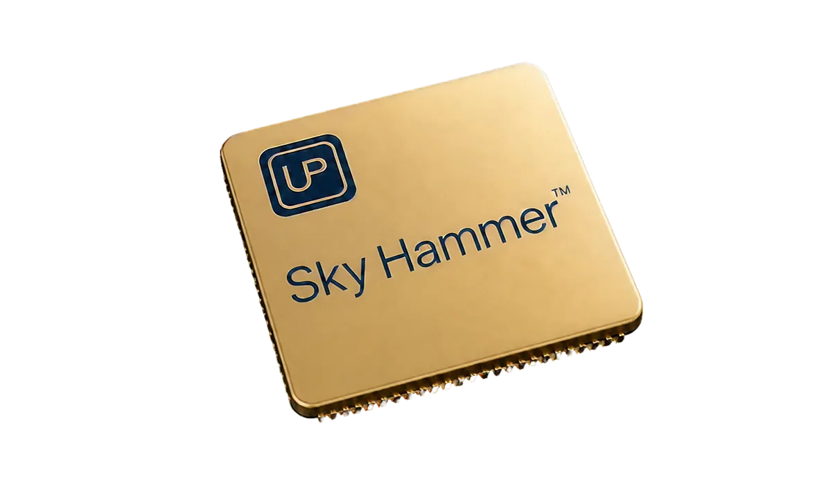 Gold-colored computer chip branded with UP logo and the word SKYHAMMER on black background.