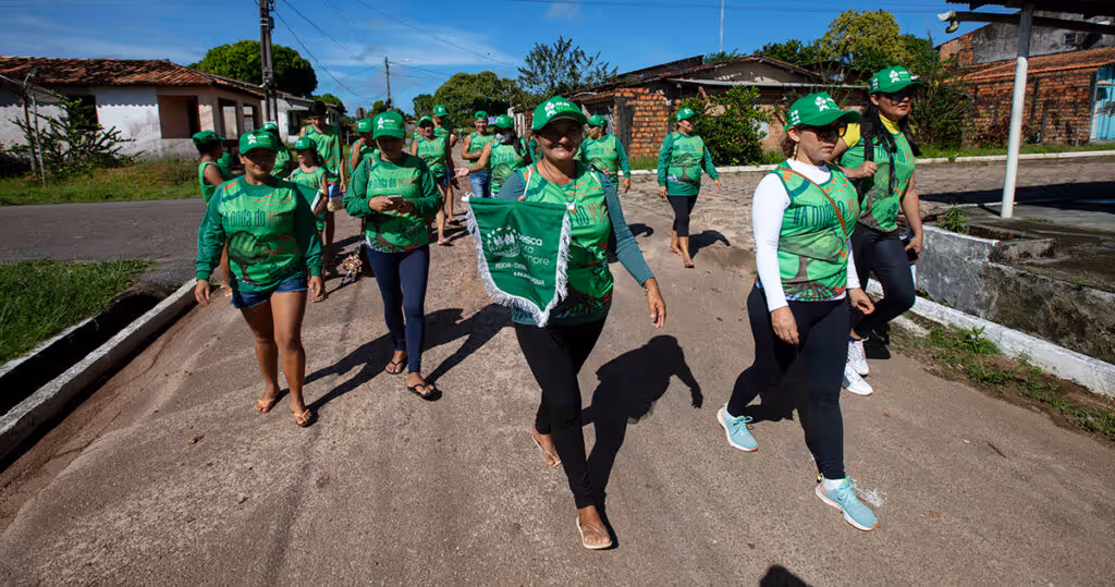Local community members of Resex São João da Ponta participate in #GreenJuly activities and march through the city.
