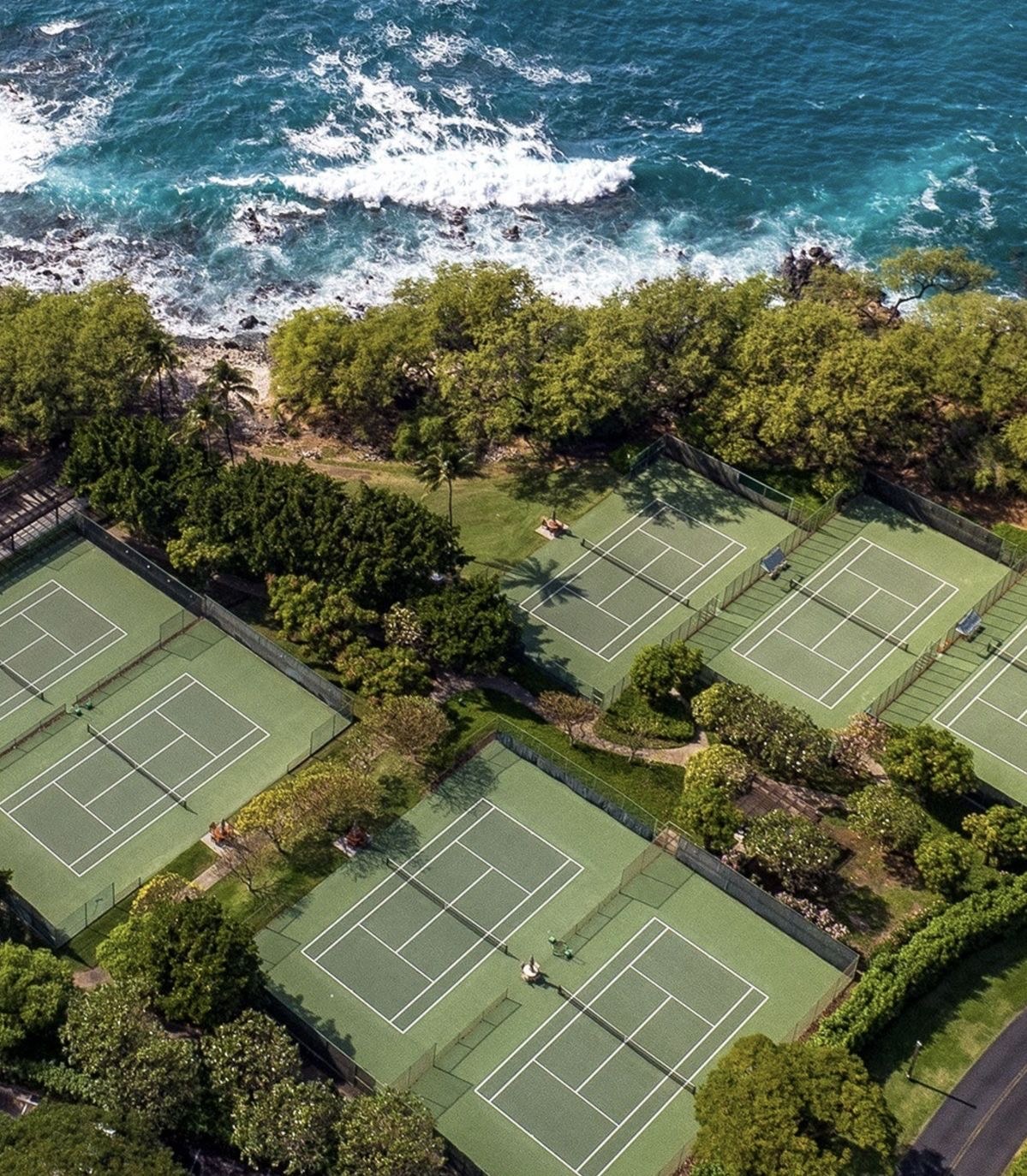 Aerial view of premium oceanfront tennis courts