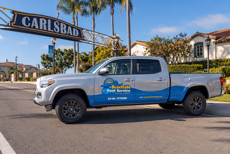Truck and Carsbad sign