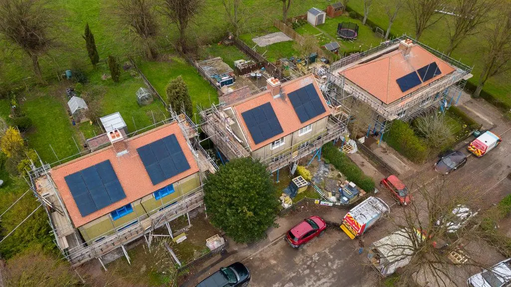 Residential retrofit project featuring rooftop solar PV installations and energy efficiency improvements across multiple homes.