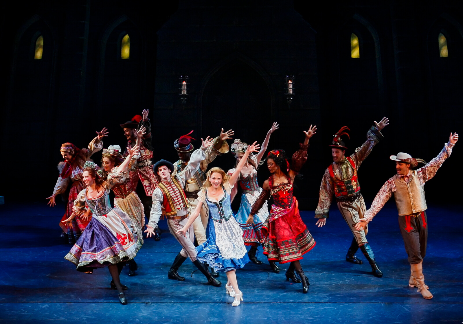 Inga (Sutton Foster) dances with the happy Villagers of Transylvania Heights.