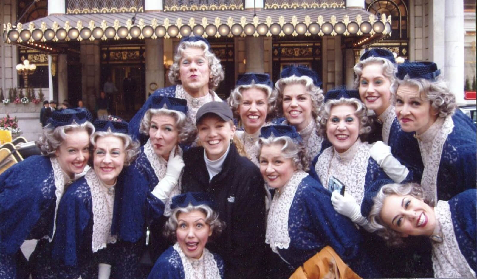 Susan Stroman with Little Old Ladies during rehearsal. They are in front of The Plaza Hotel. 