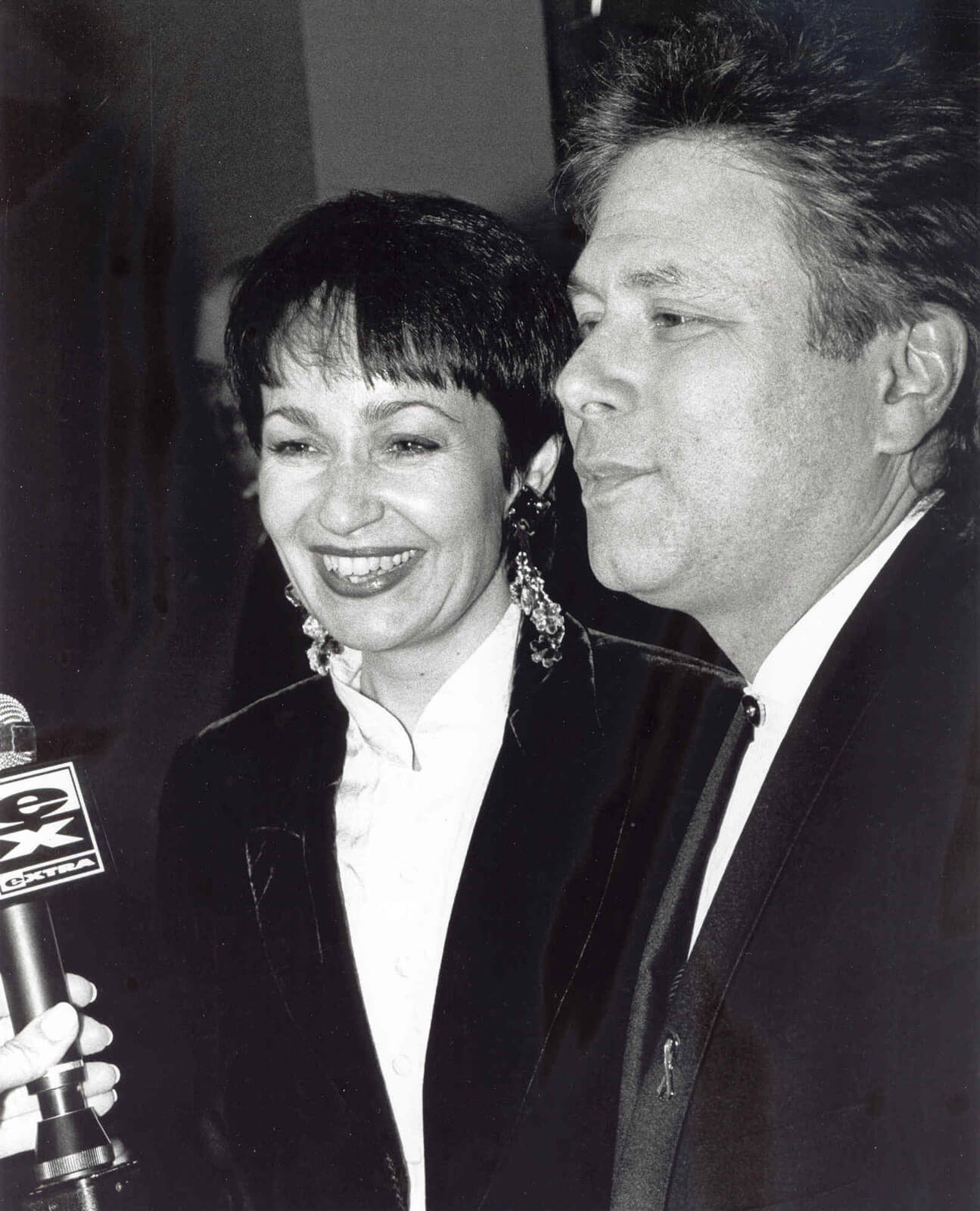 Lynn Ahrens and Alan Menken speaking to the press on opening night. Microphone from XTRA is in view.