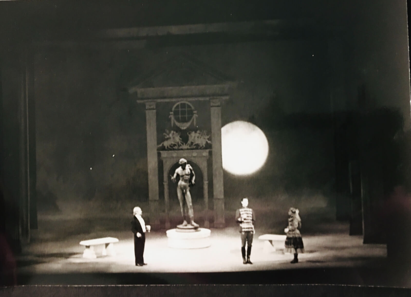 Michael Anania's garden set for "In Praise of Women". There is an a large David-like statue in the center under a full moon in A Little Night Music. 