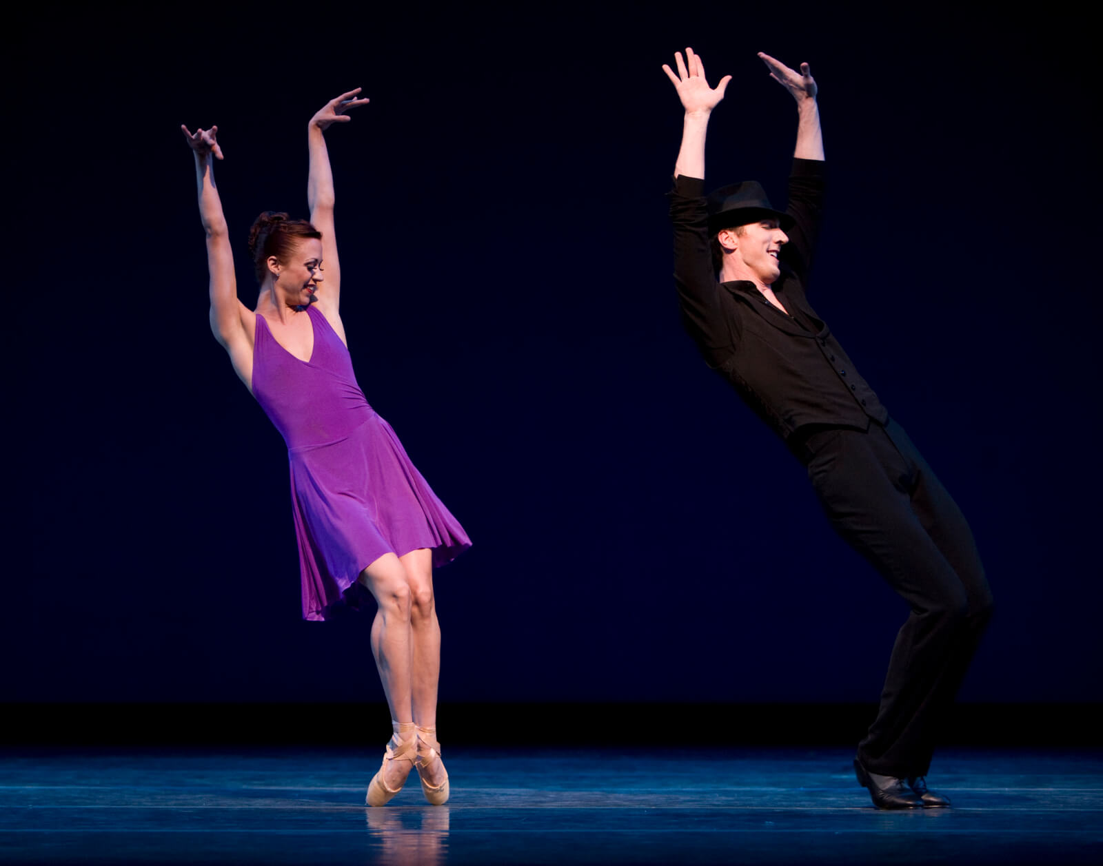 Lesley Rausch and Jeffrey Stanton) doing a jaw-dropping side pose.