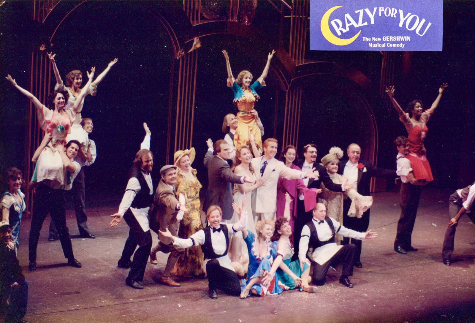 The Original Broadway Company of Crazy for You. They are in a pose for the button of the number. 