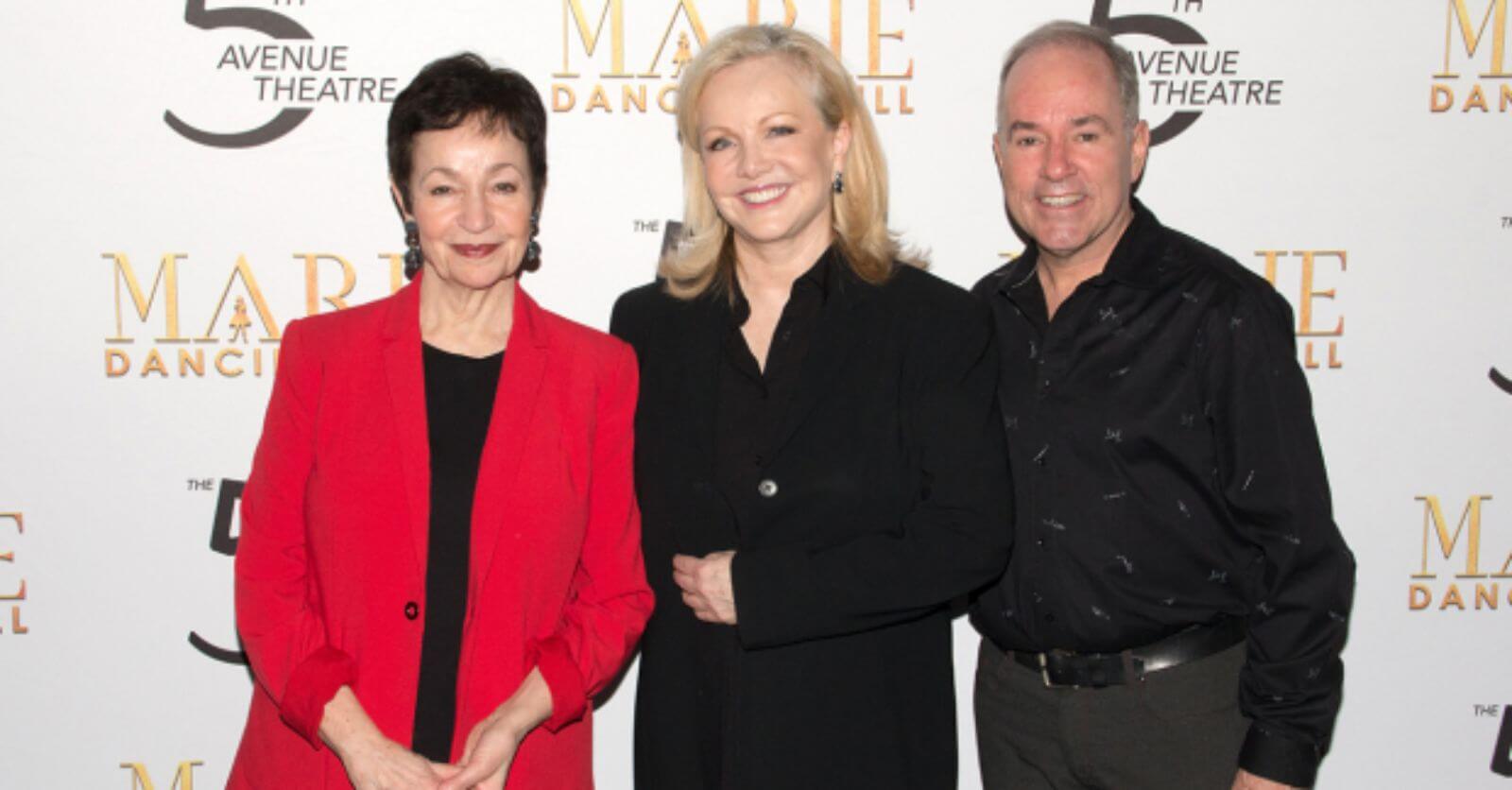 Lynn Ahrens (in a red blazer), Susan Stroman (in a black suit), and Stephen Flaherty (in black printed button up) at the opening night of Marie.