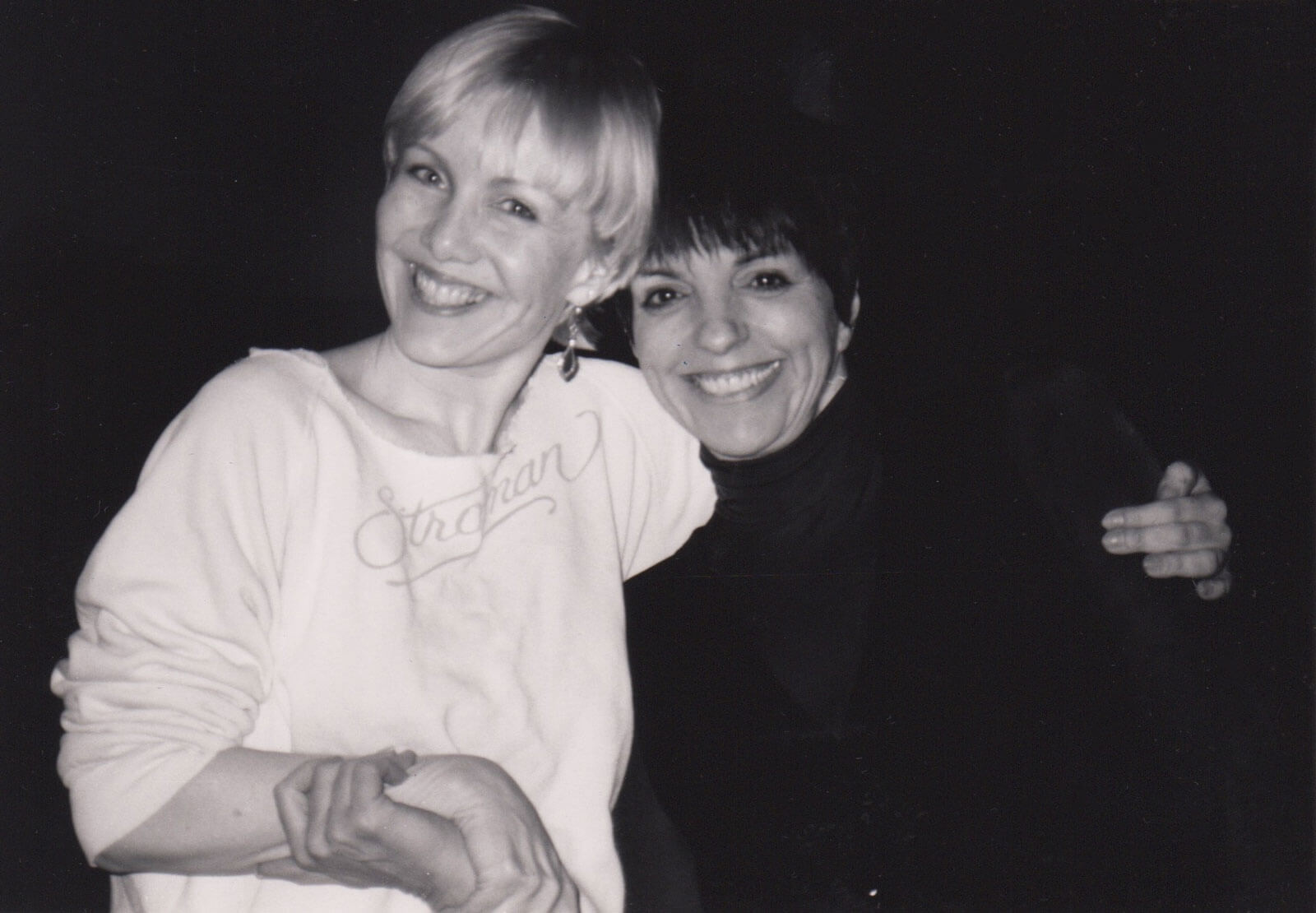 Susan Stroman (in white "Stroman" sweat shirt) and Liza Minnelli (in a black turtleneck) working together on her show at Radio City Music Hall.