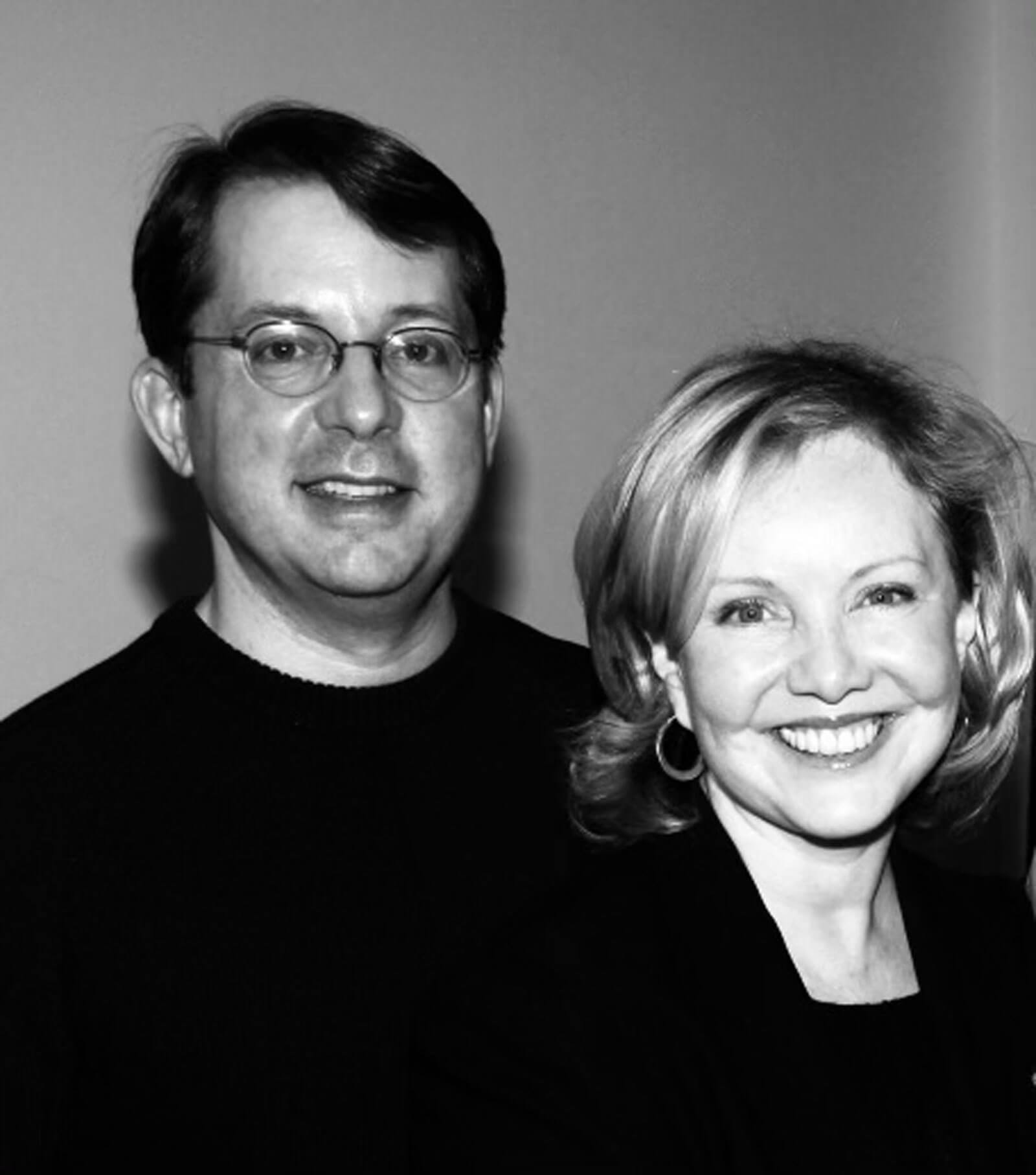 Black and white photo of David Loud and Susan Stroman. Both dressed in black.