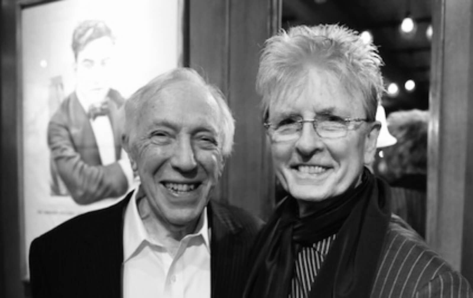 a black and white photo of producer, Bernie Gersten (left) and wig designer, Paul Huntley (right)
