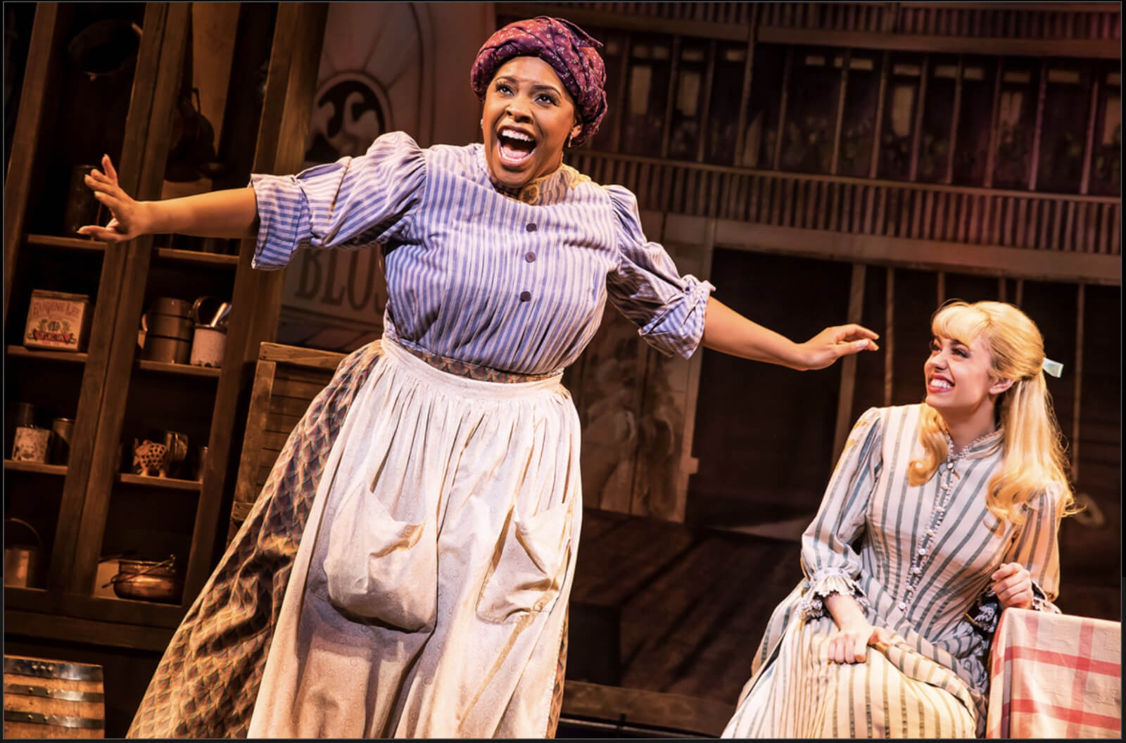 Bryonha Marie Parham playing the role of Queenie from Showboat joyfully sings "Can't Help Lovin' Dat Man of Mine". Kaley Ann Voorhees as Magnolia looks on in Prince of Broadway.