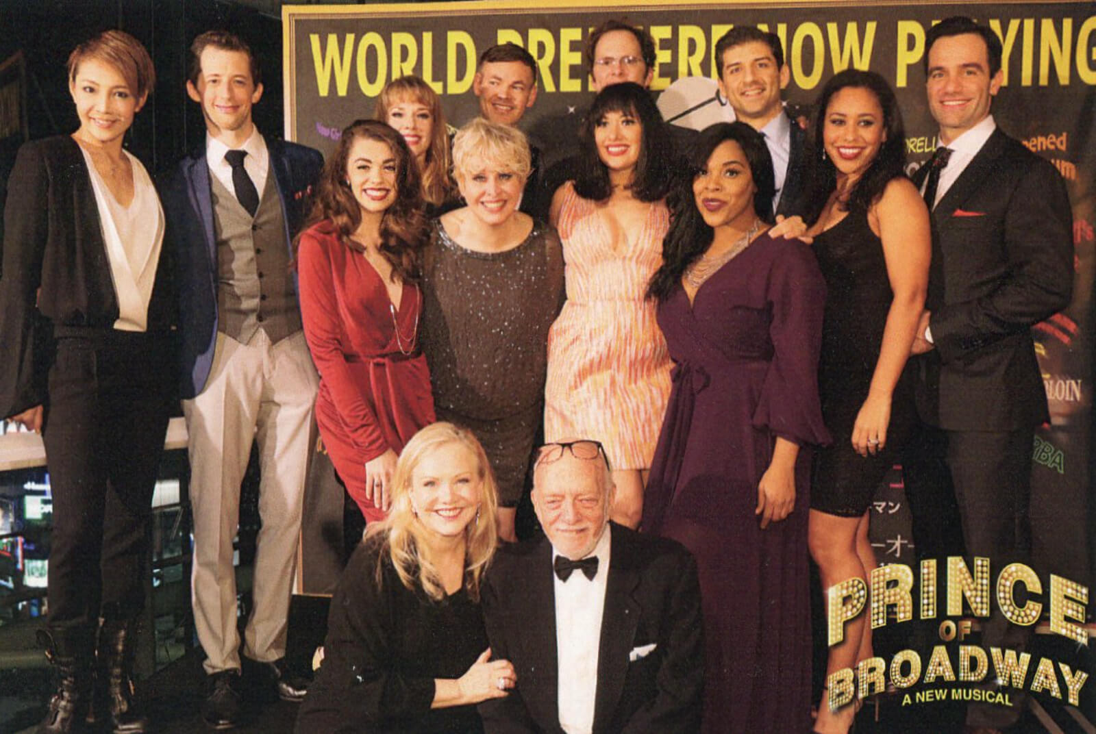 Susan Stroman and Hal Prince with the cast of Prince of Broadway opening night in Japan. They are all dressed in celebratory garb.