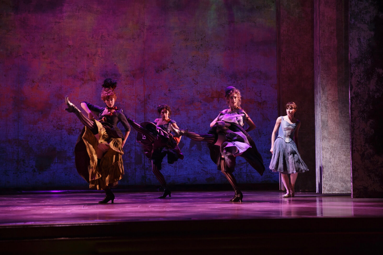 Marie wearing a casual blue dress and ballet shoes, hesitantly observing a group of dancing ladies of the evening.