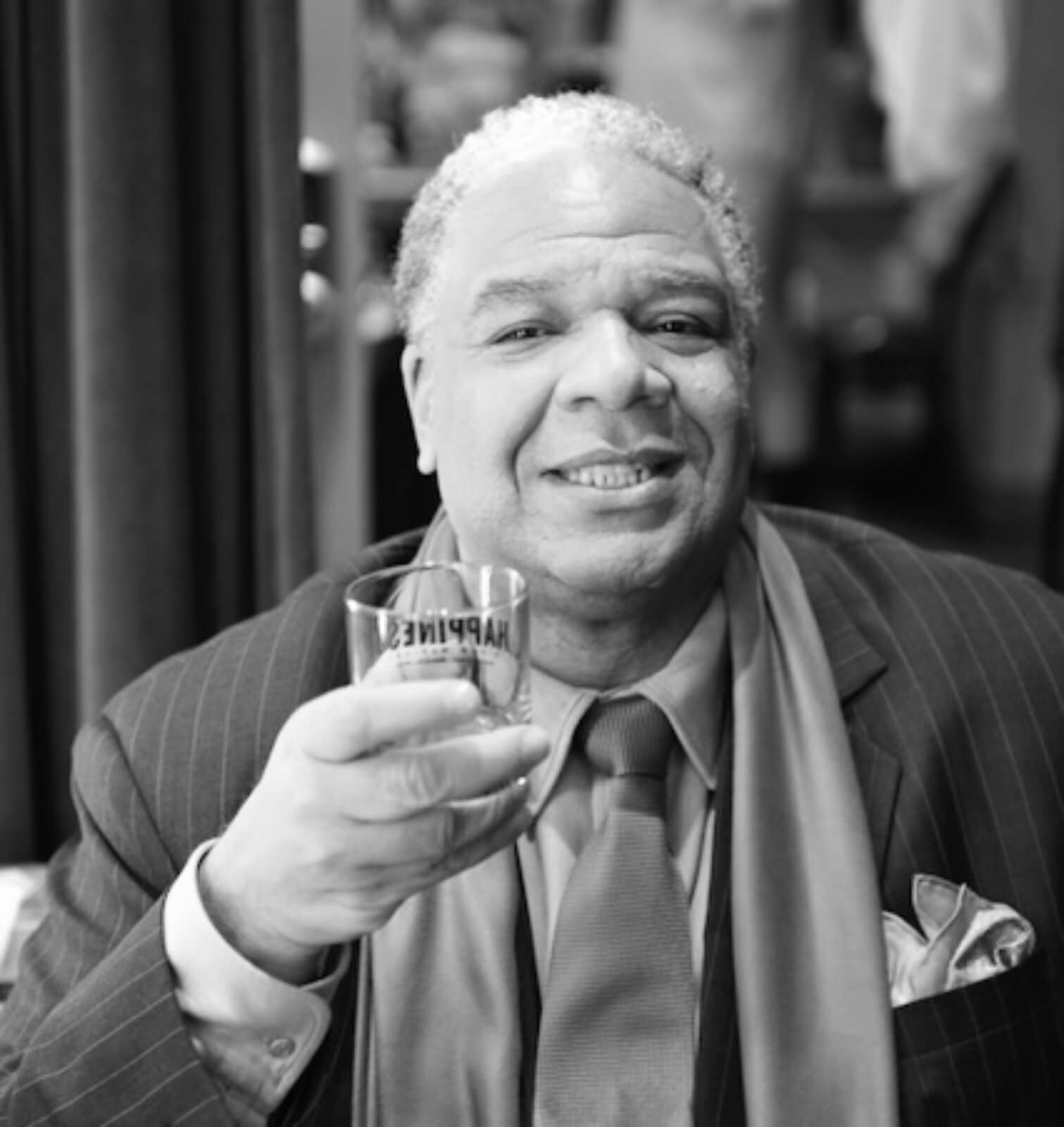 A black and white photo of Maurice (Ken Page) 