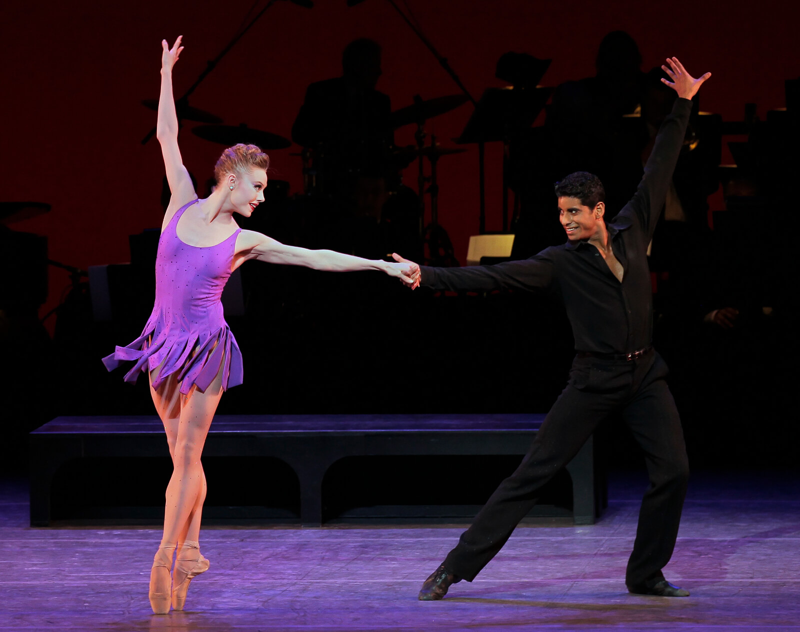 Frankie (Sara Mearns in purple) and Johnny (Amar Ramasar in all black) in a partnering section of For the Love of Duke.