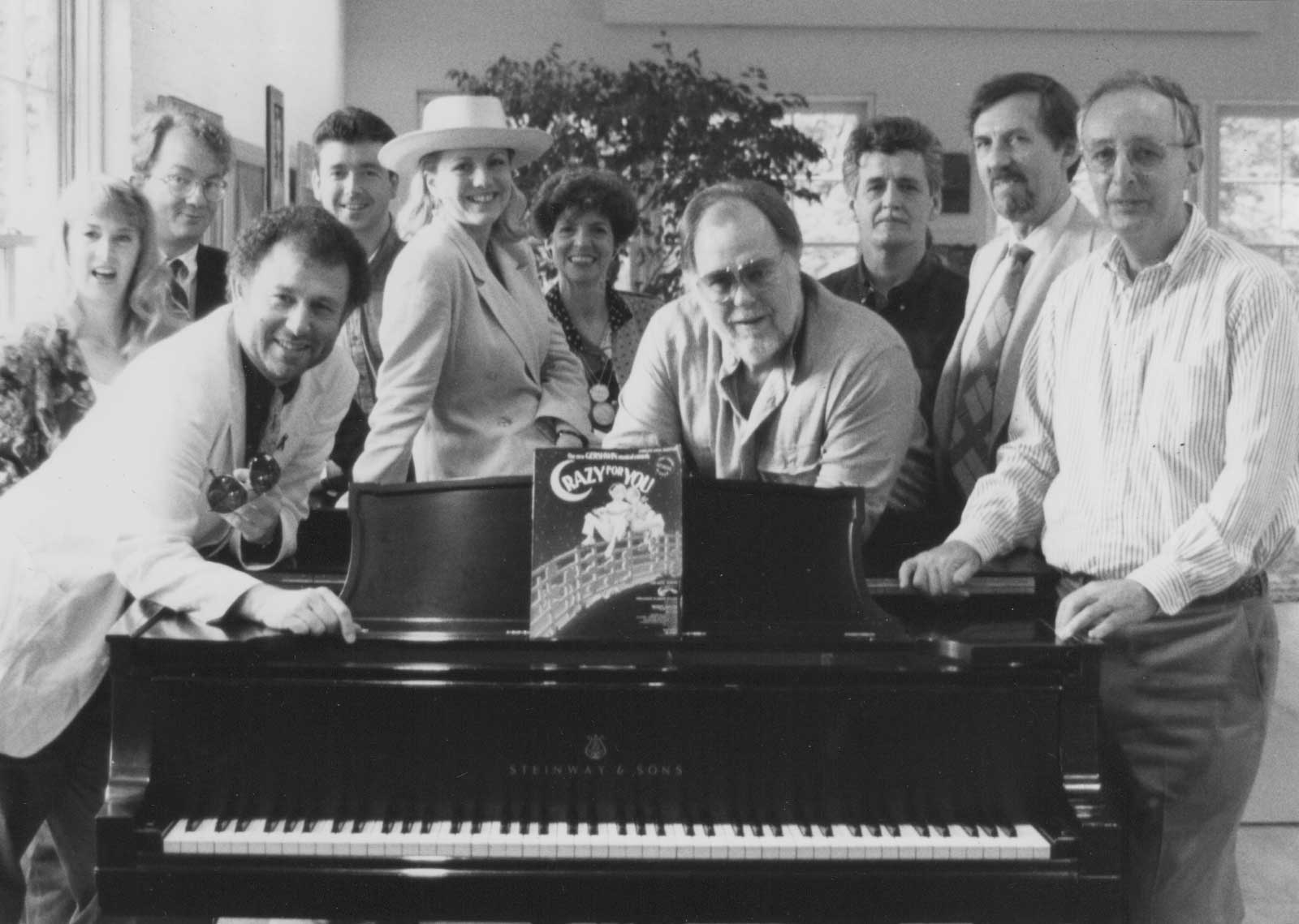 The Creative team of Crazy for You at the home of Producer Roger Horchow. Gershwin himself played that piano.